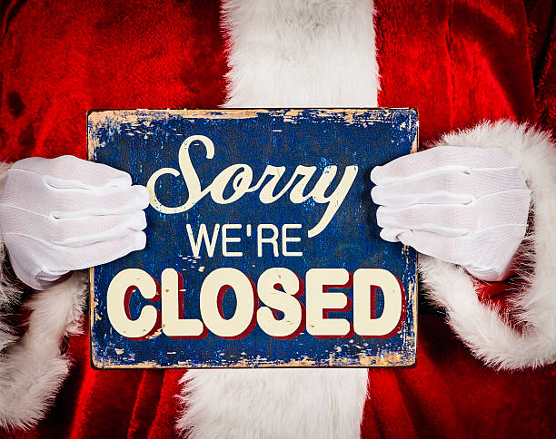 Santa with Sign showing store is closed**fine grain has been added to this image